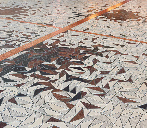 Floor tiles designed after a tree leaf motif